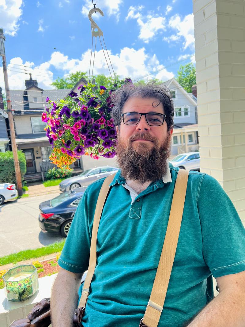 It&rsquo;s a picture of Raymond on his porch on a sunny day.